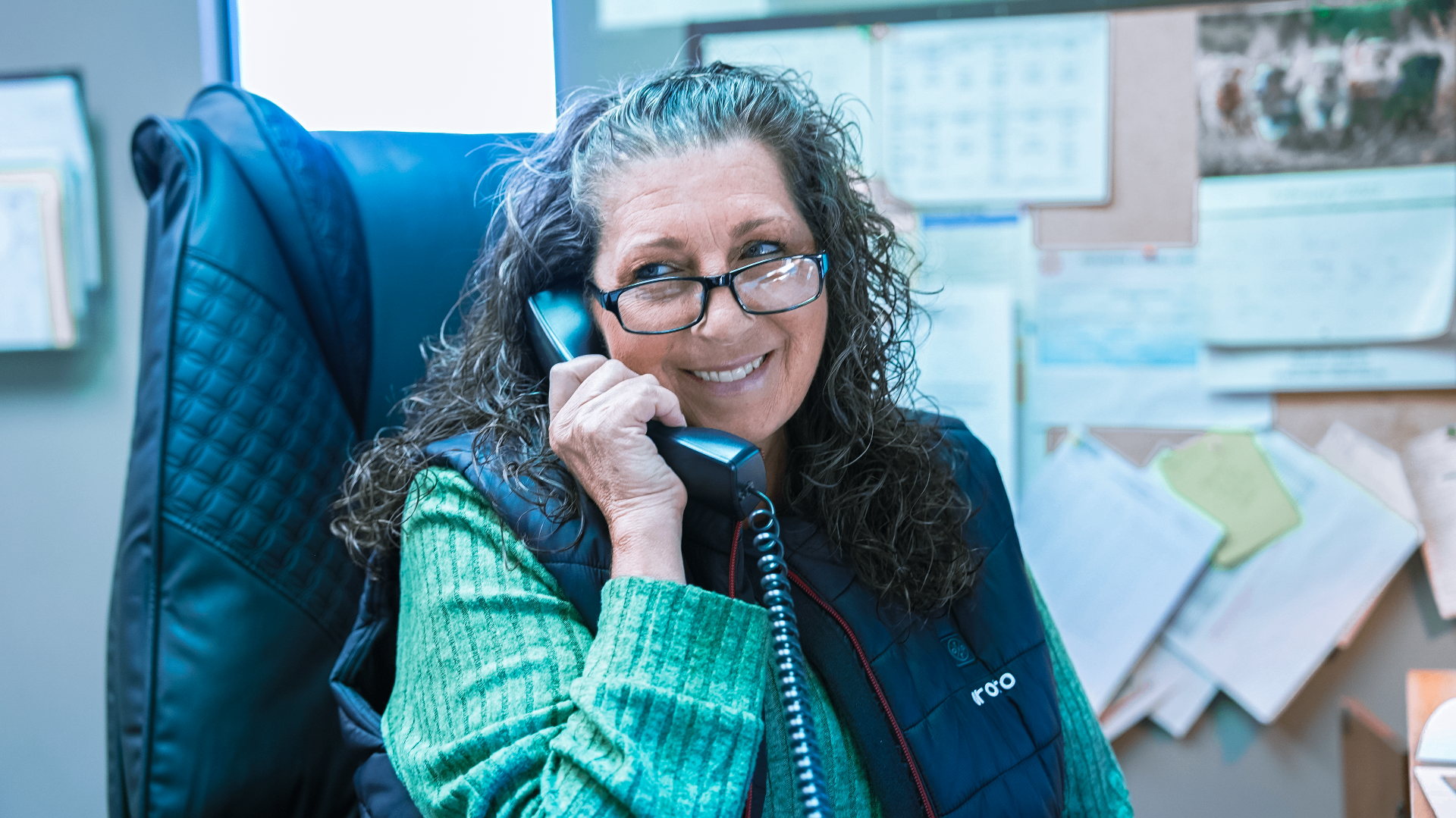 Front-office dispatcher answering a call from a new lead